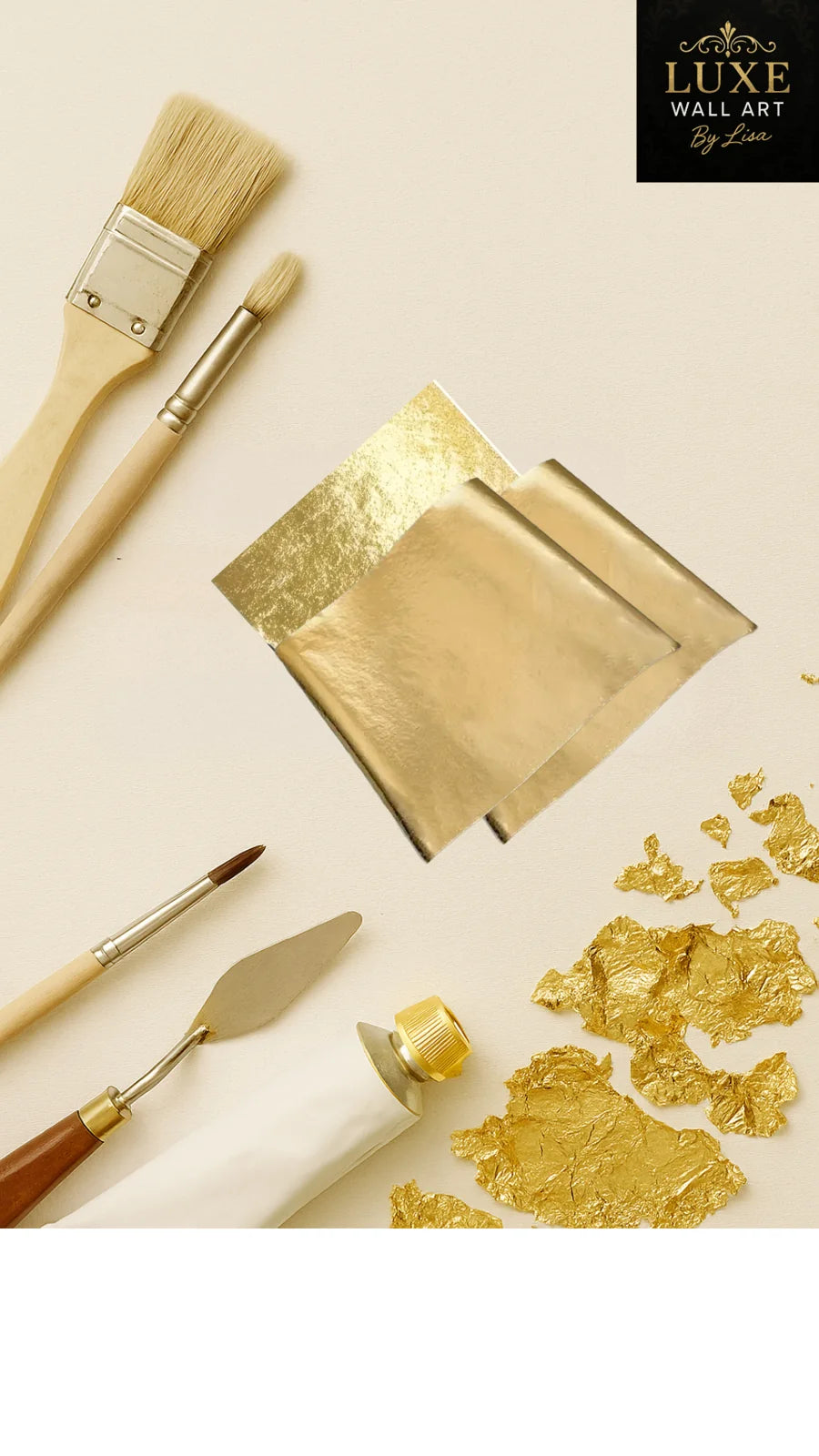 Gold leaf sheets, palette knife and premium brushes on neutral backdrop.