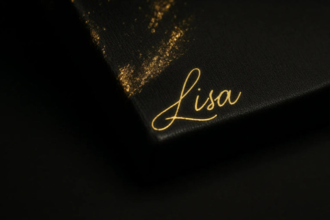 Close-up of canvas corner with gold foil speckles and ‘Lisa’ signature.