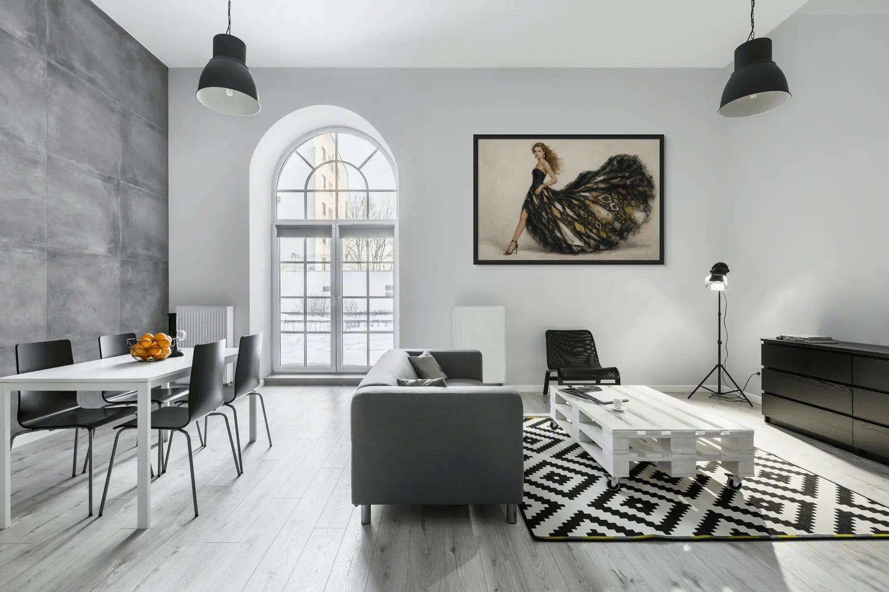 Luxury black and gold wall art with gold leaf detailing displayed in a contemporary living room with arched window