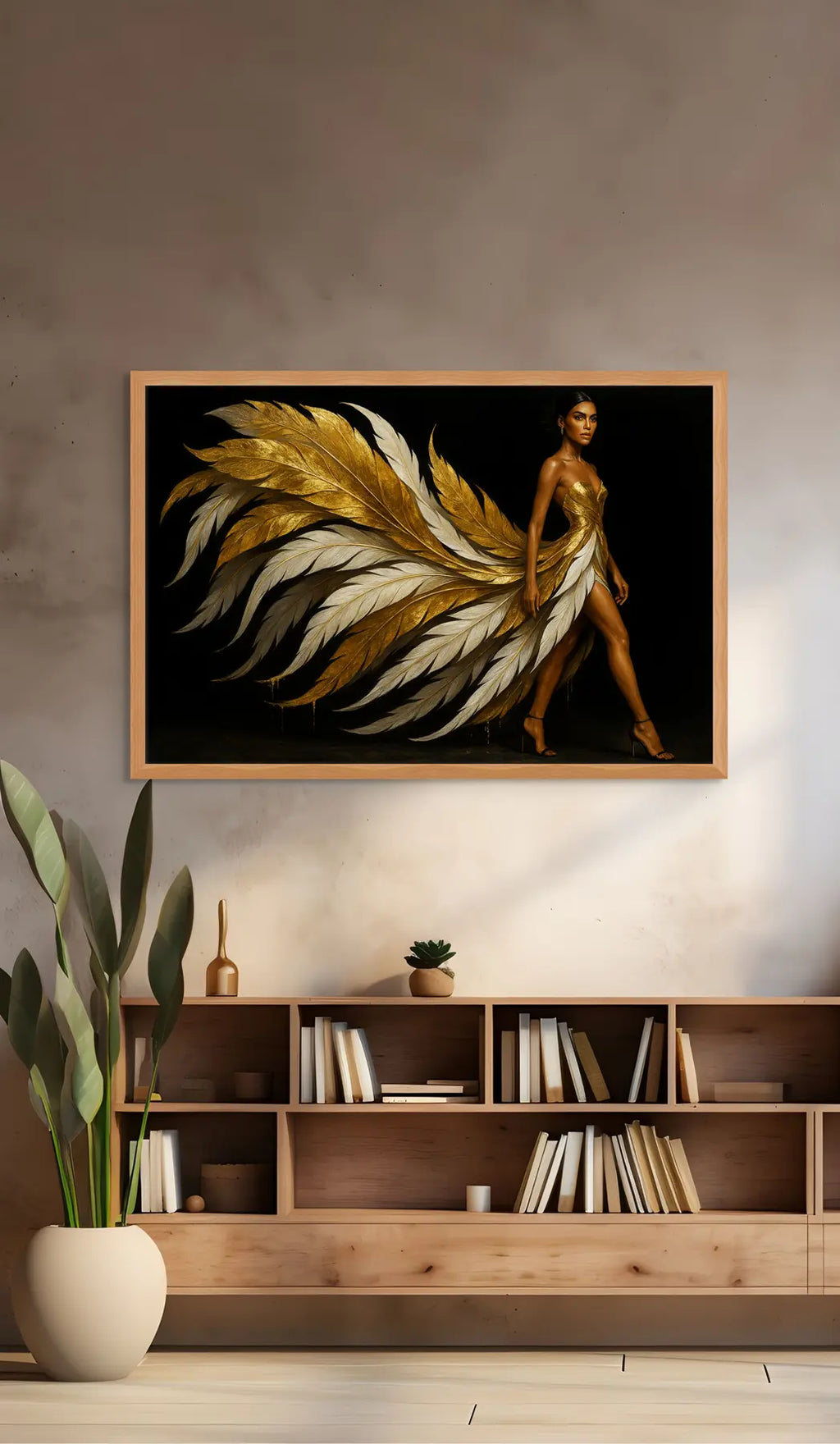 Gold feather wall art displayed above a wooden bookshelf in a modern interior