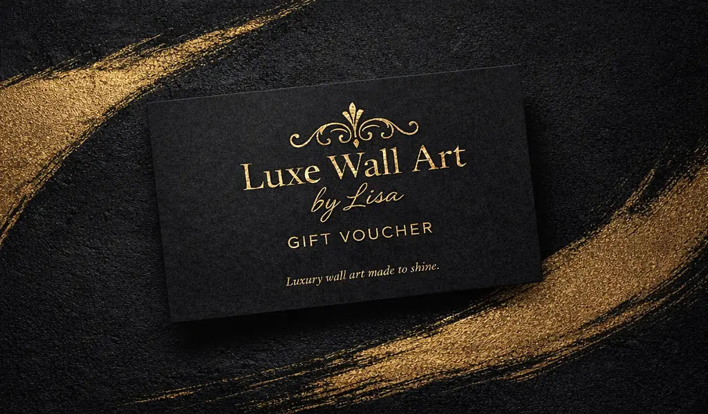 Luxury online gift voucher from Luxe Wall Art by Lisa featuring a black textured background with sweeping gold brushstroke accents and elegant gold foil typography, no denomination shown.