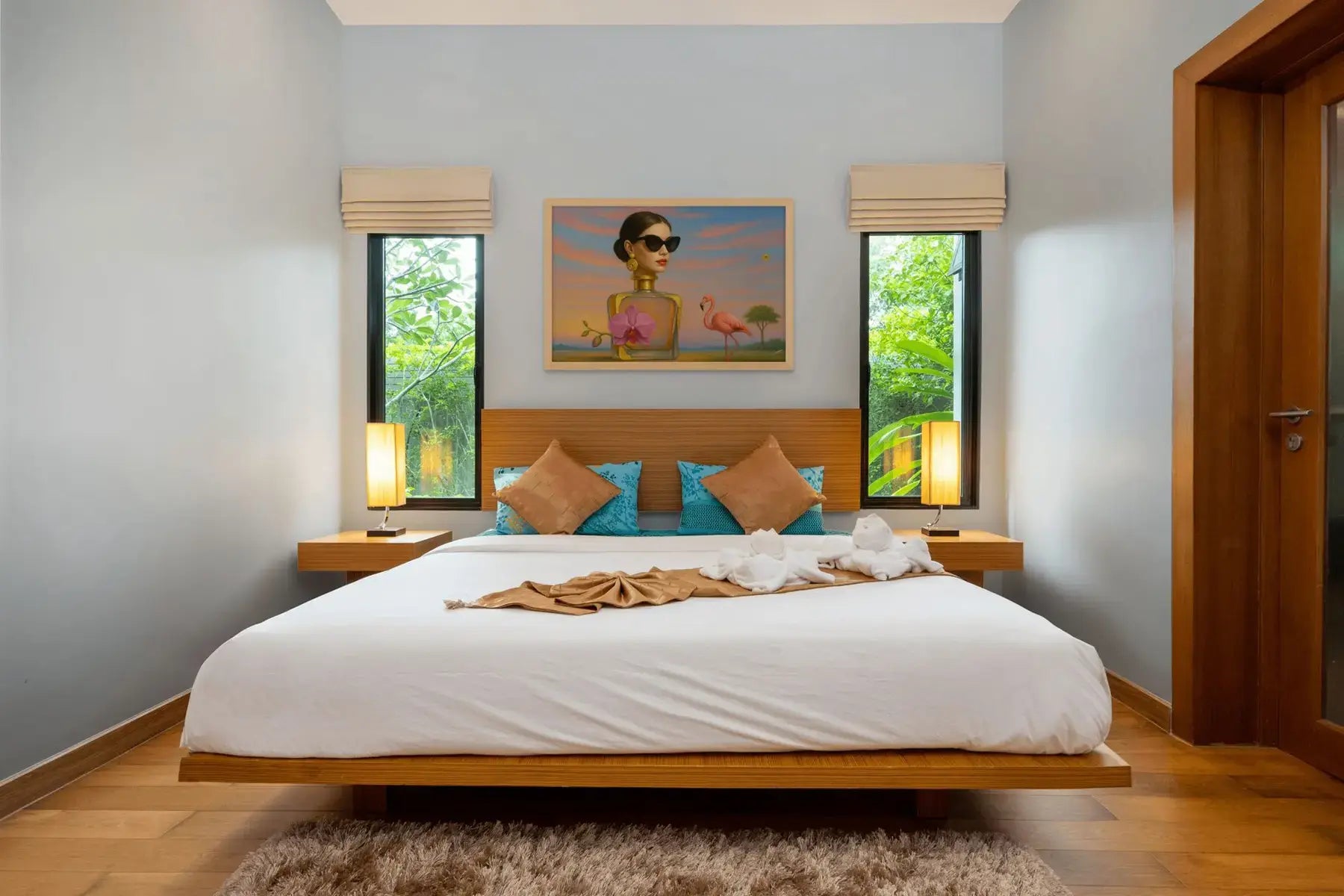 Orchid Essence fine art print – floral couture portrait with dramatic florals and surreal symbolism, shown in a modern bedroom.