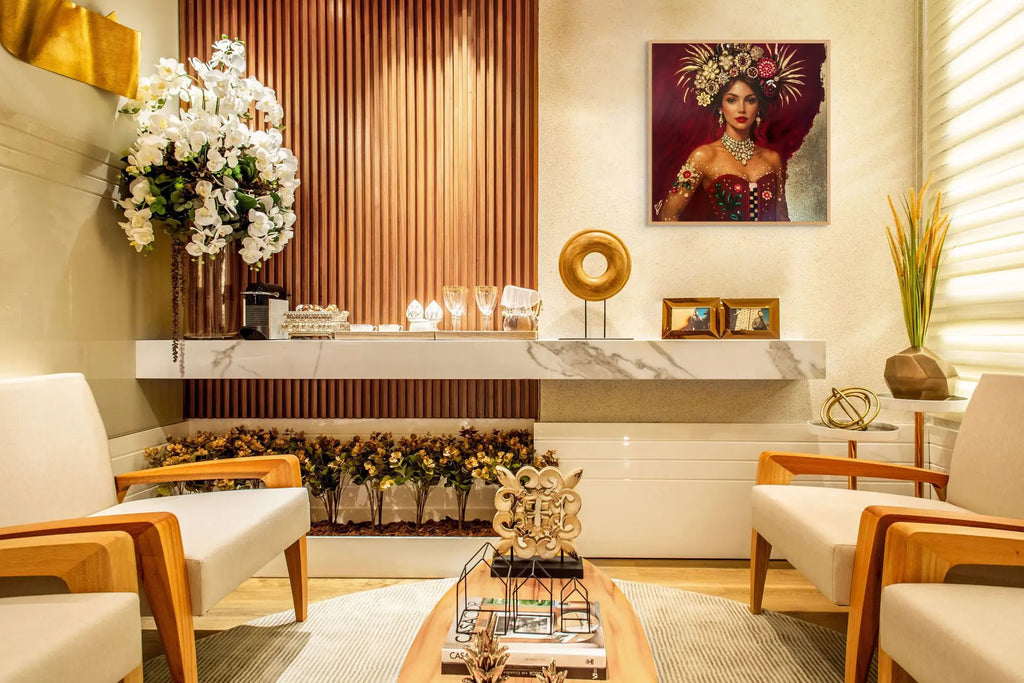 Sophisticated designer interior featuring a glamorous gold leaf portrait painting of an elegant woman with floral headpiece and jewel details, displayed against warm timber wall panelling and marble finishes.