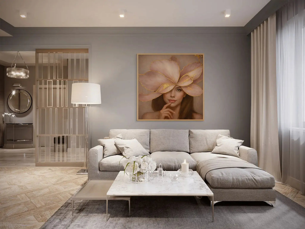 Luxury gold leaf portrait painting Gilded Honey II styled in an oak frame above a neutral grey sofa in a refined contemporary living space.