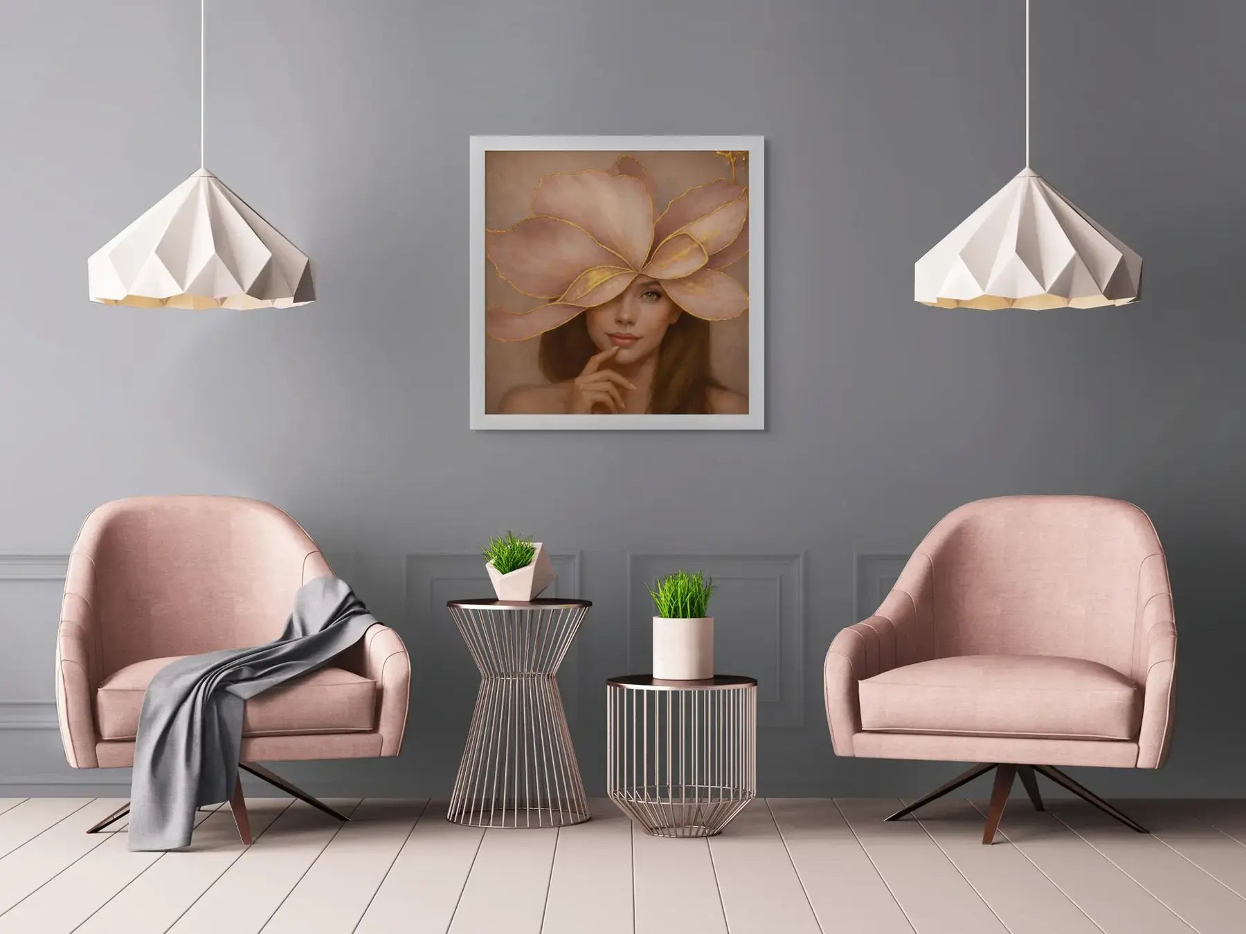 Luxury gold leaf portrait painting Gilded Honey II displayed in a white frame between blush pink velvet chairs in an elegant modern sitting area.