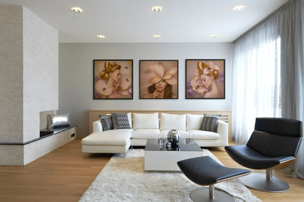 Luxury gold leaf portrait triptych Gilded Honey presented in black frames above a contemporary sofa in a modern living room.