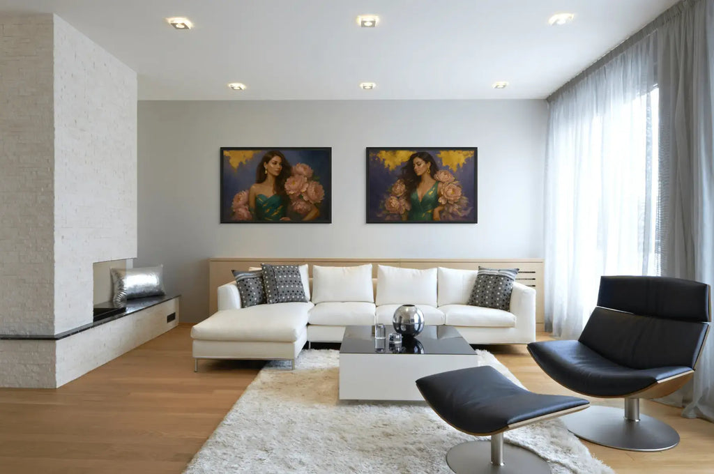 Luxury gold leaf original painting featuring elegant women in emerald green gowns with blush peonies, displayed in black frames above a modern white sectional sofa in a contemporary living room interior.