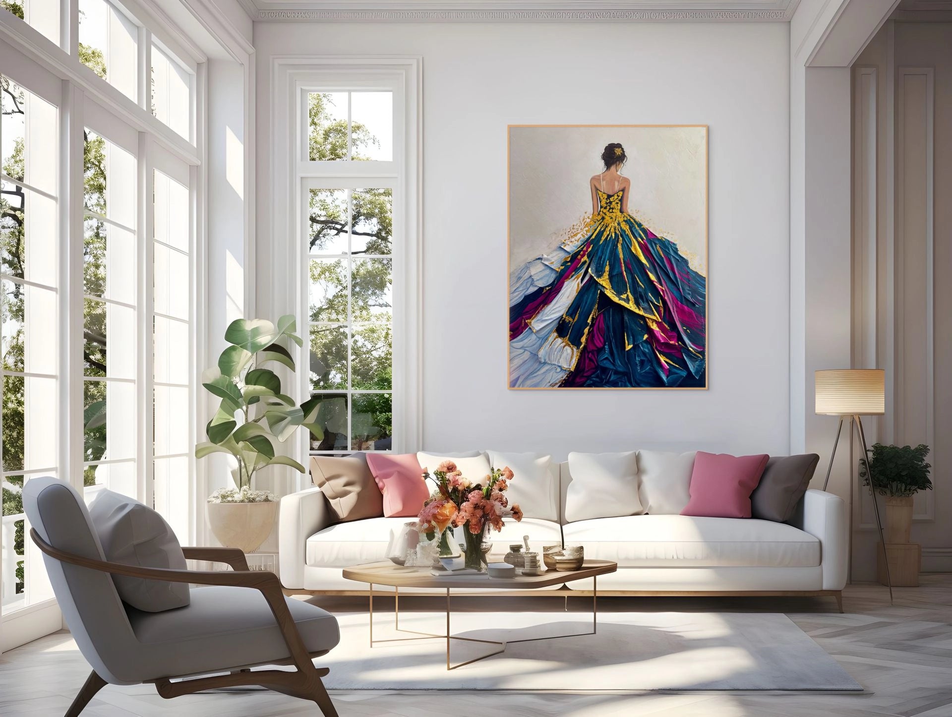 Luxury living room featuring colourful fashion-inspired wall art of a woman in a dramatic layered gown with gold leaf accents, displayed above a modern white sofa in a bright elegant interior.